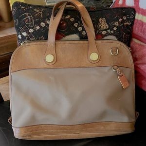 Leather trimmed full zip canvas tote in good condition